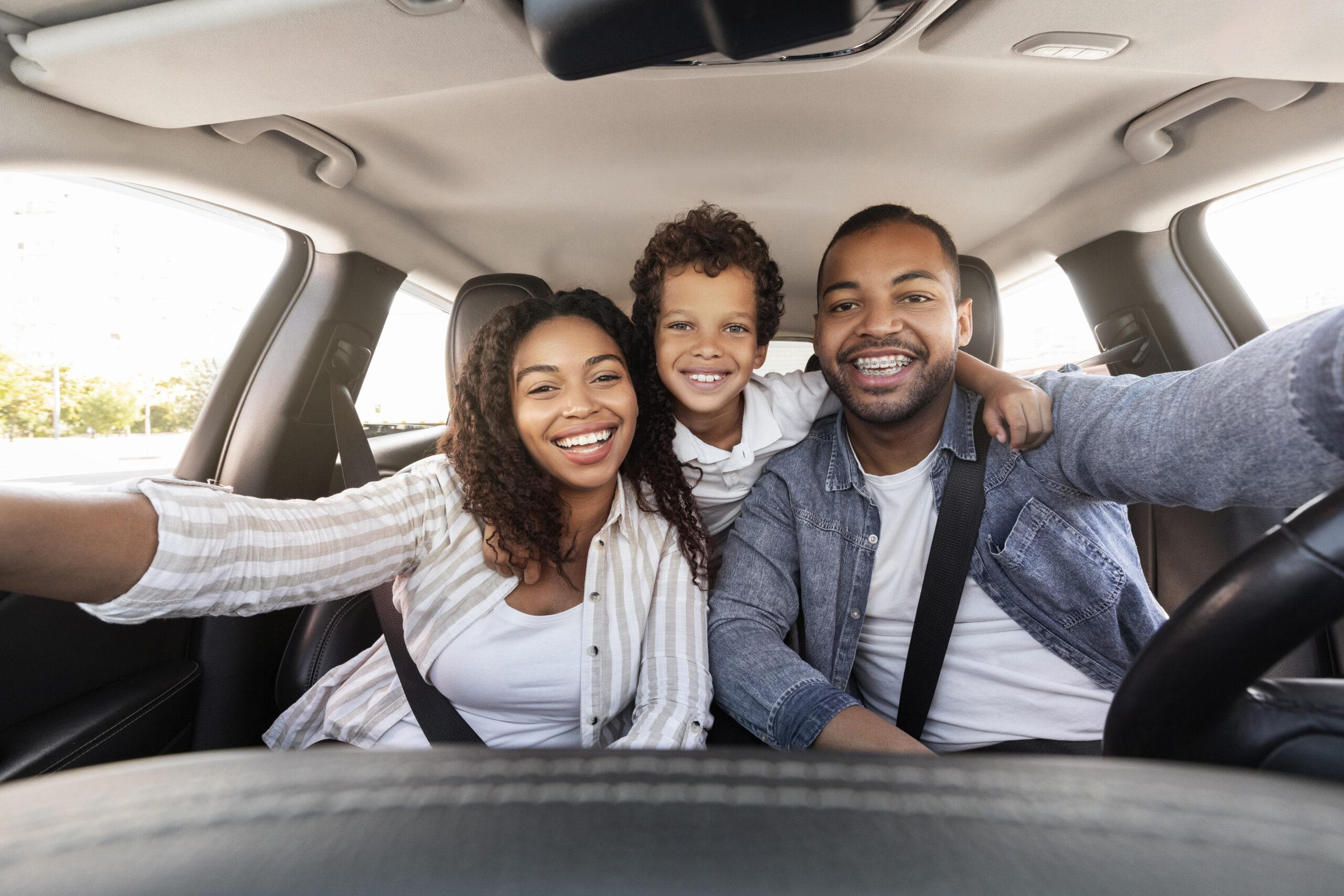 South African family travelling confidently in their own car - No Finance Cars rent-to-buy