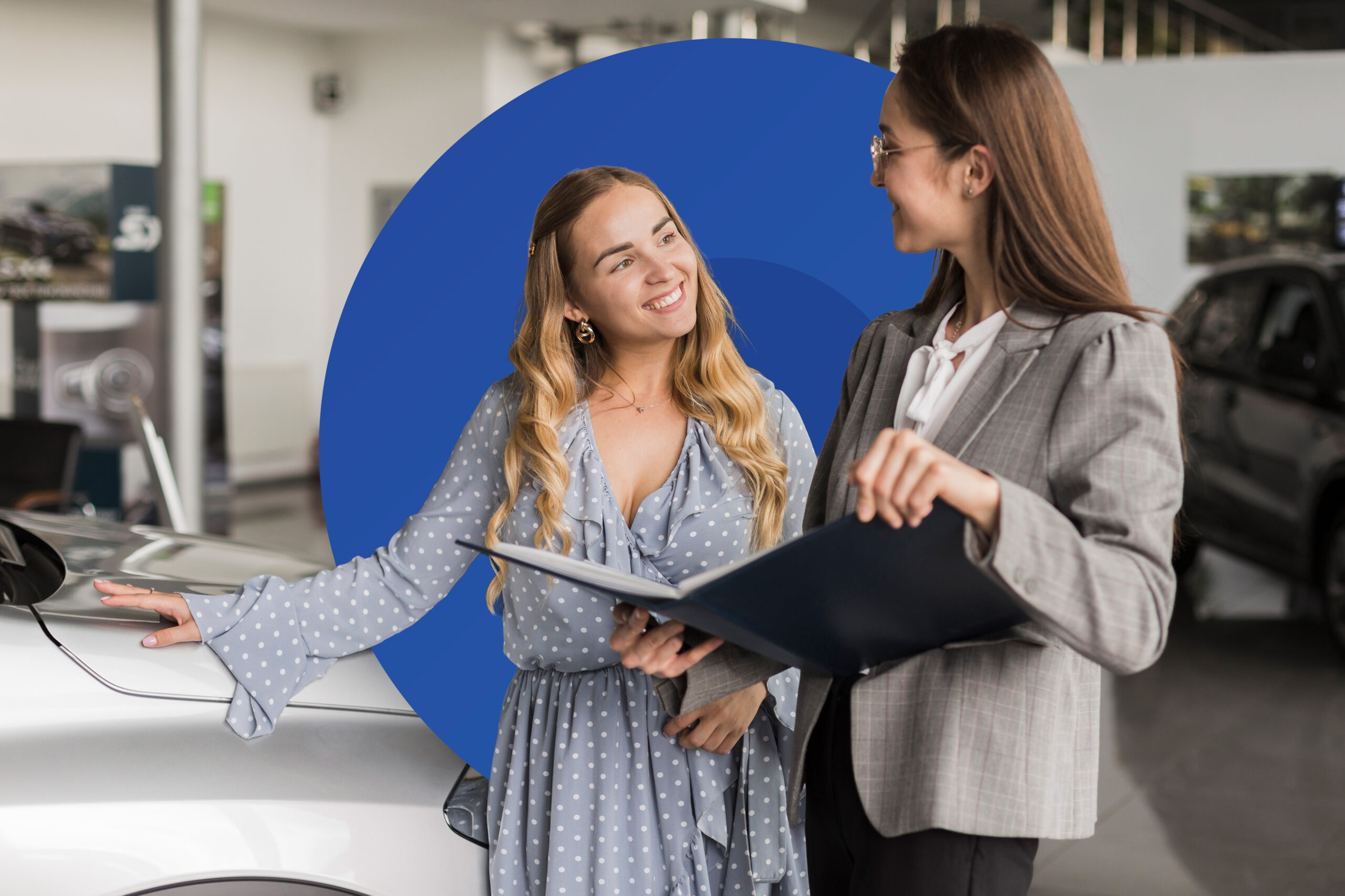 Woman reviewing finance documents with a dealership consultant next to a new car